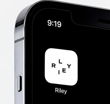 Close-up of the RILEY app icon on a phone.